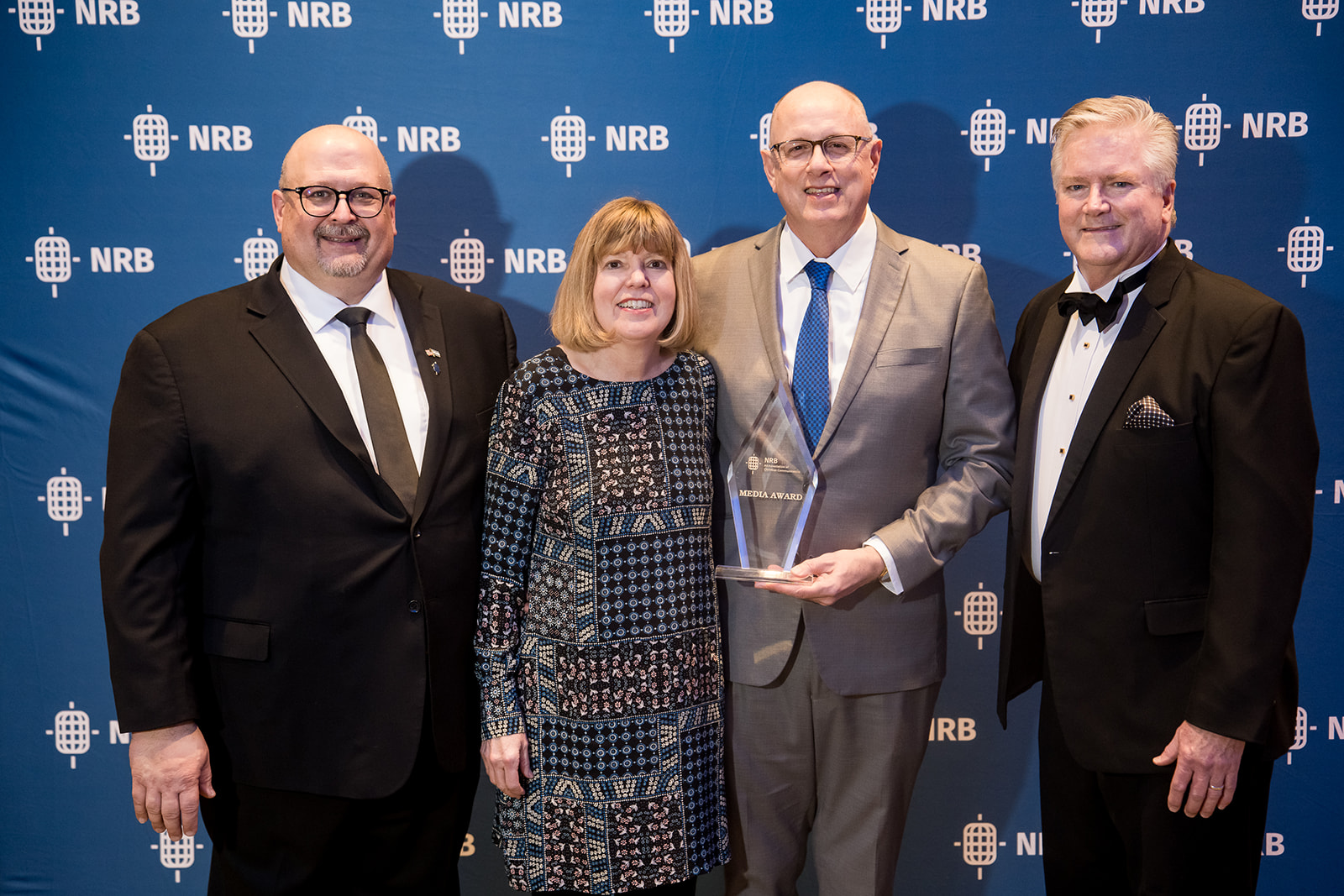 Tom Hollis (2nd from Right), accepted the NRB Hall of Fame Award, in memory of Co-Founder Russ Bixler.  Pictured with wife Jean Hollis and NRB representatives.