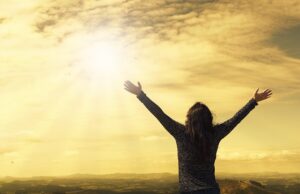 woman with raised hands